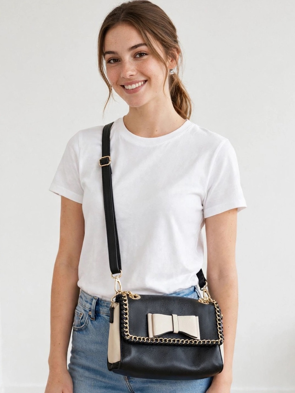 Betsey Johnson Crossbody Bag with Bow and Chain Detail
